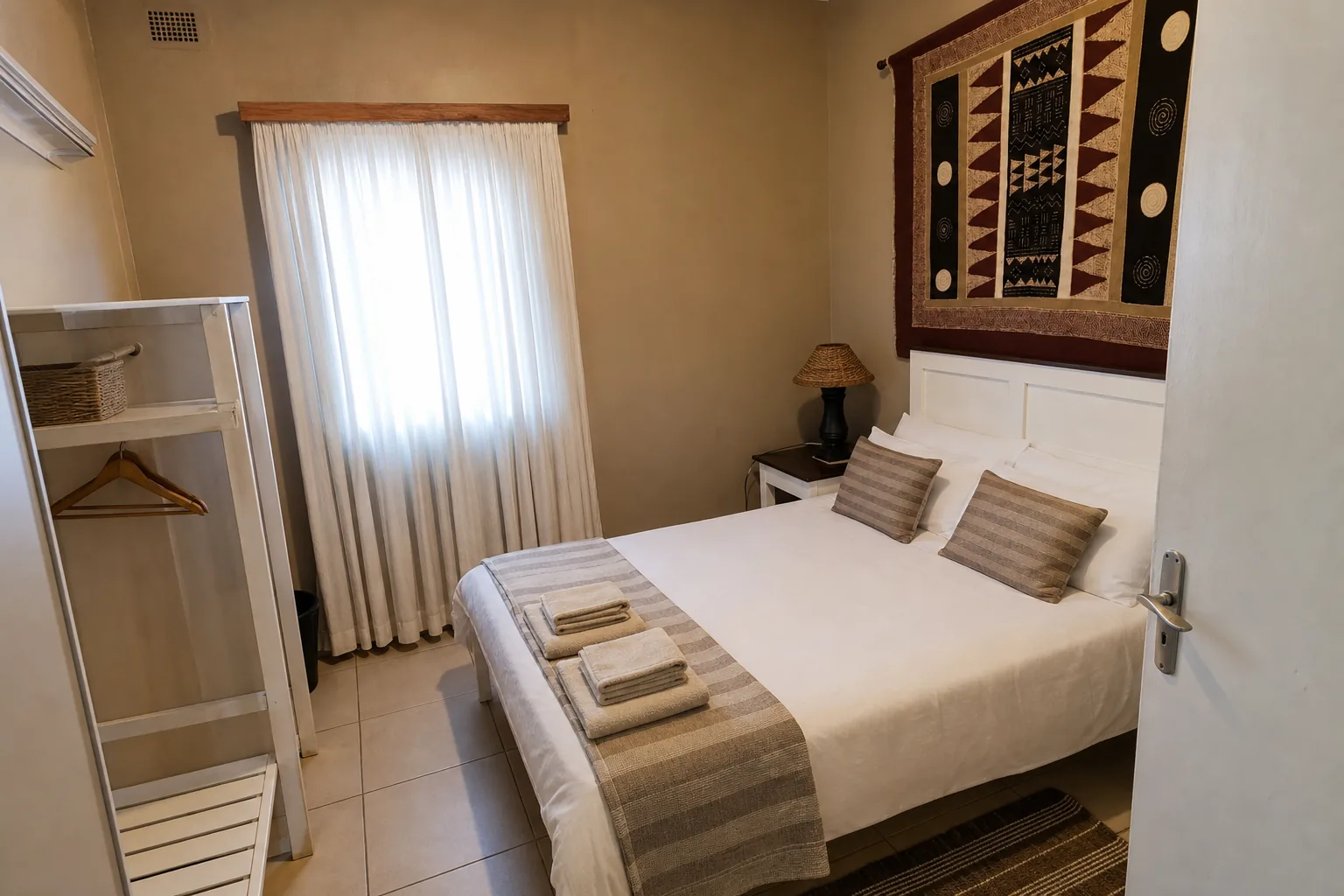 Elephant simple double room viewed from the doorway