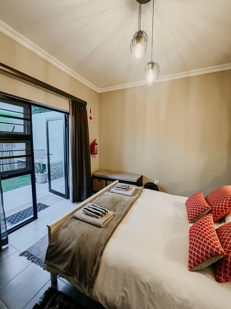 Lion bedroom opening onto the patio