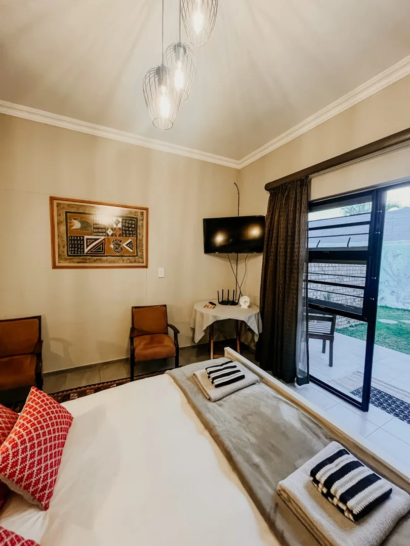 Lion queen bed beside the patio doors