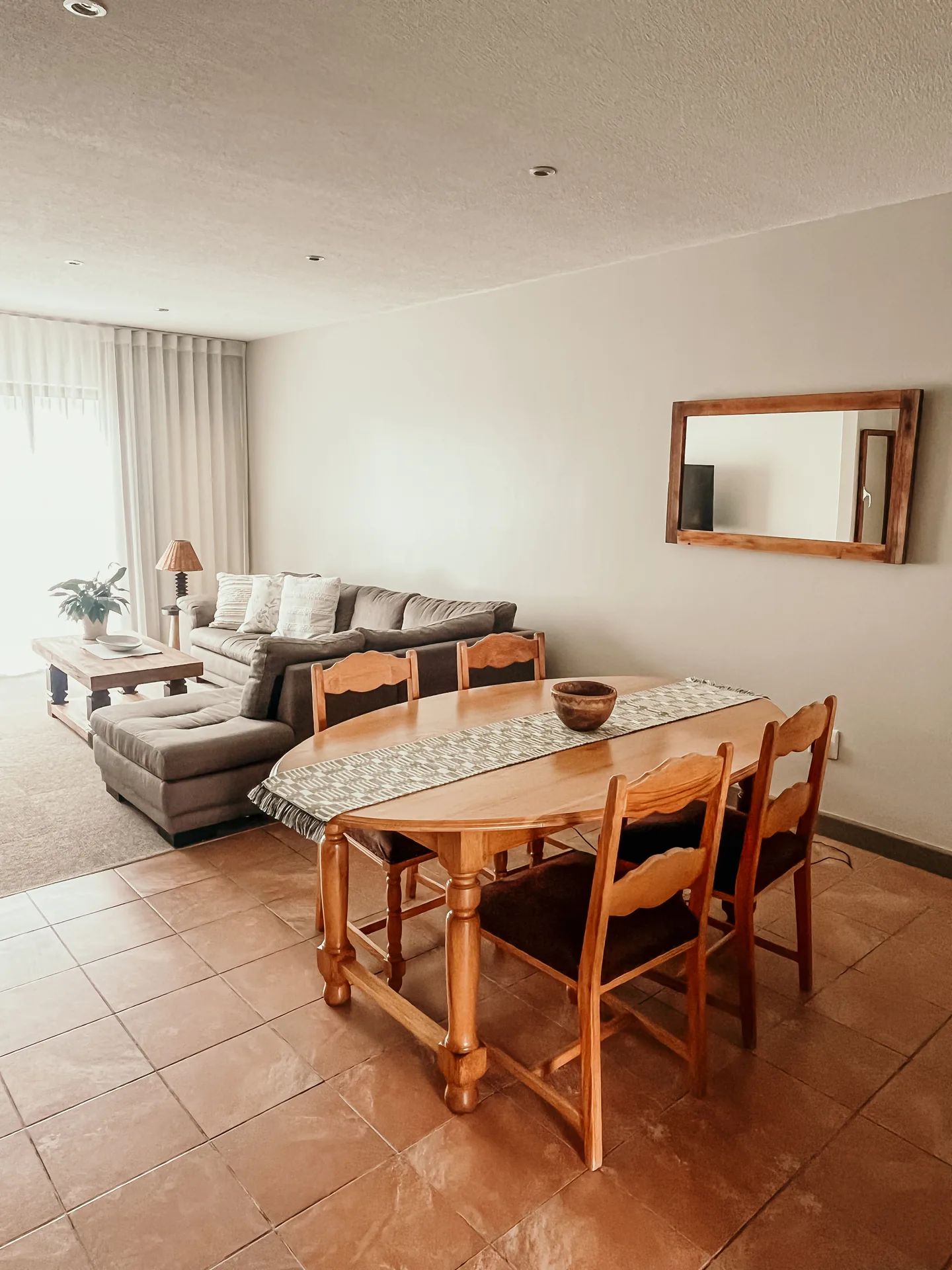 Moringa dining area with living room beyond