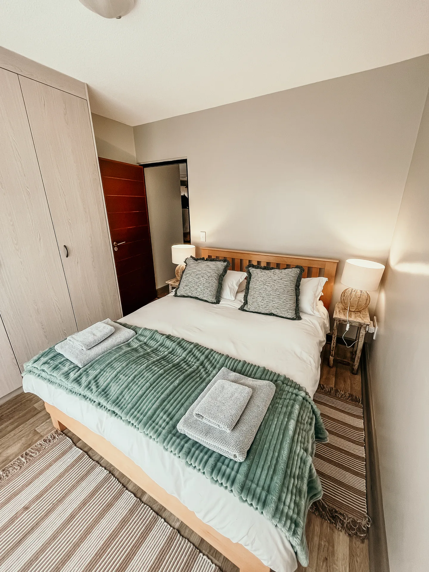 Moringa main bedroom with queen bed and built-in wardrobe