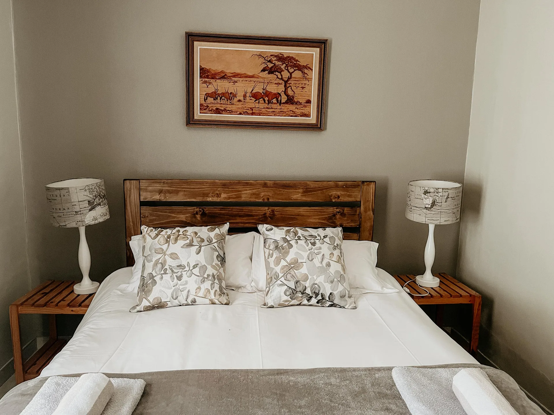 Oryx queen bedroom with wooden headboard
