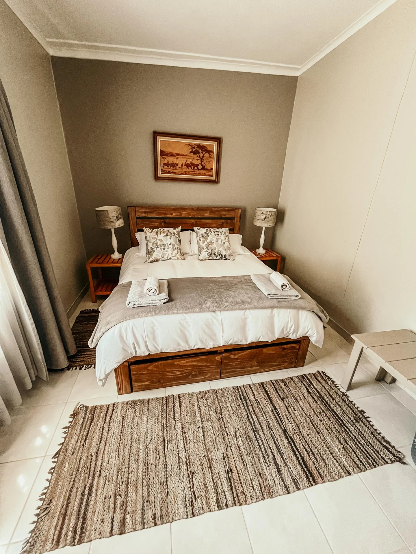 Oryx queen bedroom viewed from the foot of the bed